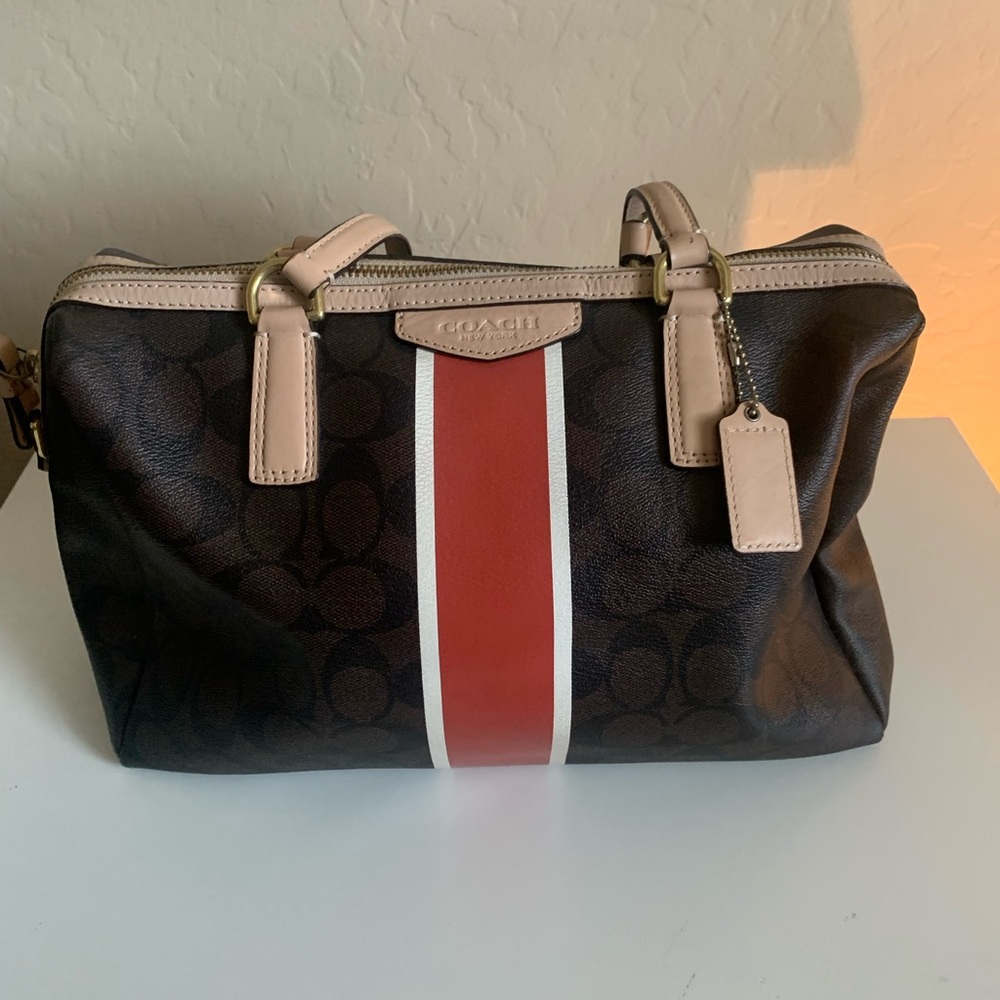 Coach purse with stripe
